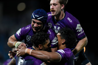 The Storm celebrate a try by winger Josh Addo-Carr on Friday night.