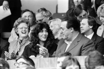 Ghislaine became her father’s favourite as she grew up. She is pictured with the magnate in 1984, watching an Oxford v Brighton soccer match. 