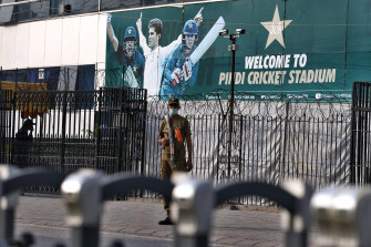 A policeman stands guard outside the Pindi Cricket Stadium following the cancellation of New Zealand’s first one-day match in Rawalpindi last week.