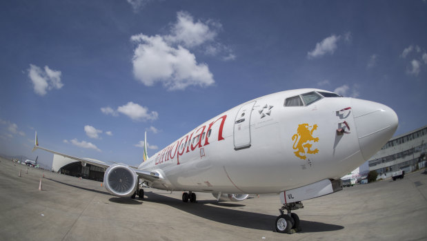 An Ethiopian Airlines Boeing 737 Max 8 sits grounded at Bole International Airport in Addis Ababa, Ethiopia on Saturday.