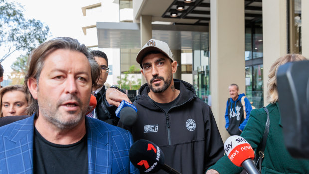 Marlion Pickett (centre) outside court in Perth.