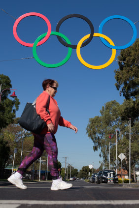 2018: The Olympic rings still sit high above the village, and at ground level. 