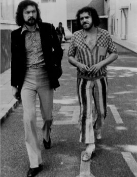 Joe cocker and his manager Nigel Thomas. When asked if the group would be allowed to land in the US, 
Mr. Thomas said: “Everythings’s fine this time.” 17 October 1972.