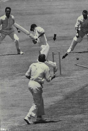 Bails fly as Alan Davidson clean-bowls Englishman Fred Titmus in 1963.
