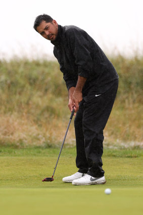 Jason Day putts on the 14th at Royal Liverpool.