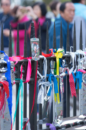 The railings outside St Patrick's Cathedral have been festooned with ribbons.
