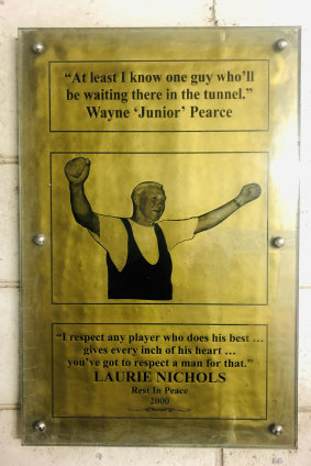 The Laurie Nichols plaque in the tunnel at Leichhardt Oval.