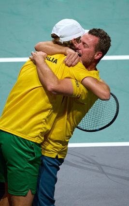 Purcell and Lleyton Hewitt embrace after last year’s Davis Cup semi-final victory.