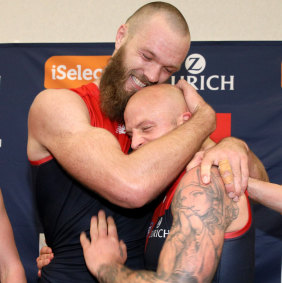 The bald truth: Max Gawn and Nathan Jones celebrate after
yesterday's win, knowing the Demons will make the finals. 