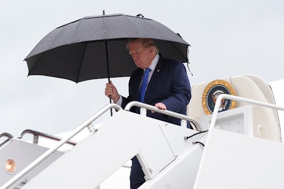 Donald Trump exits Air Force One at Andrews Air Base in Washington on Sunday.