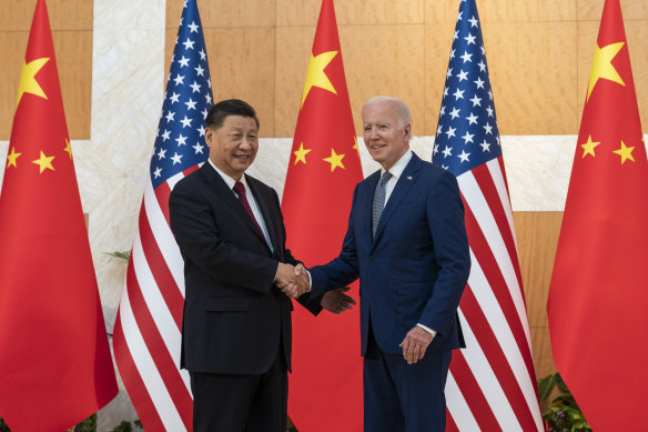 President Joe Biden, right, and Chinese President Xi Jinping shake hands before a meeting on the sidelines of the G20 summit in November 2022.