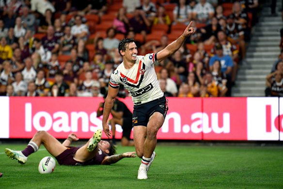 Billy Smith celebrates scoring for the Sydney Roosters against the Brisbane Broncos.