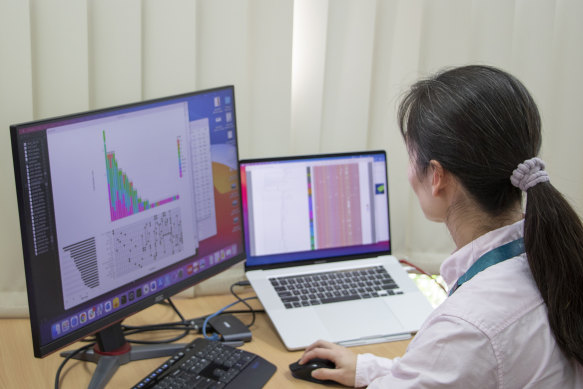 A Q-PHIRE Genomics bioinformatician analyses viral genetic sequences.