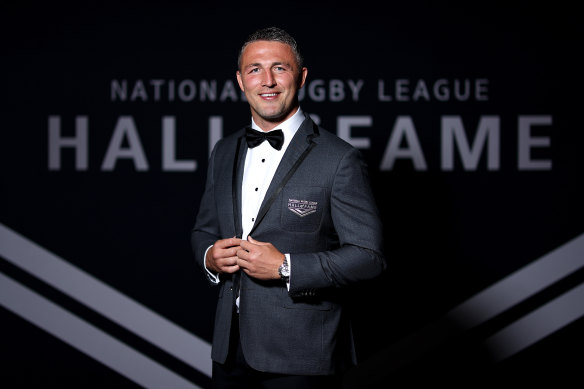 Sam Burgess poses in his Hall of Fame blazer.