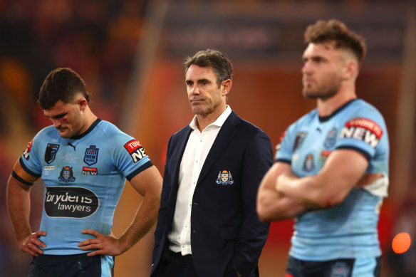 A dejected Brad Fittler with vanquished Blues Nathan Cleary and Liam Martin.