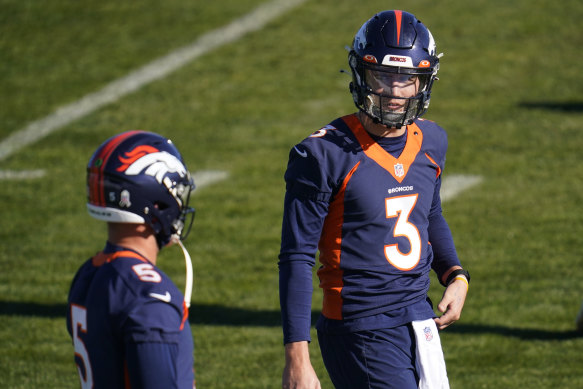 Drew Lock (right) with Riley Neal, two of the Broncos' four quarterbacks who are unable to play against the Saints.