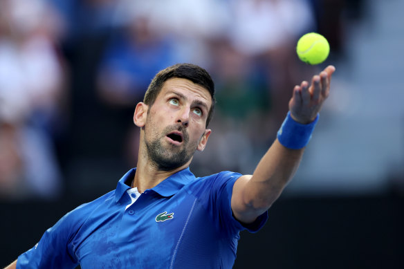 Novak Djokovic serves during his opening-round match against Dino Prizmic on Sunday.