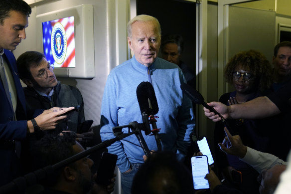 US President Joe Biden speaks to the media on Air Force One on his return trip to Washington DC.