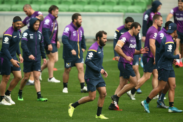 Cameron Smith (centre) and his Storm teammates will be back in action on Saturday night.