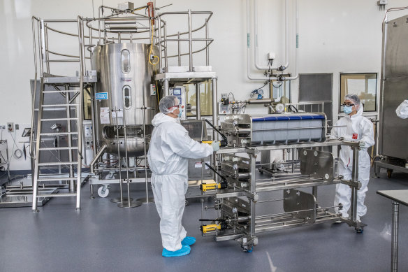 Scientists working in CSL’s production facility for the AstraZeneca vaccine. 