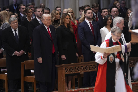 President Donald Trump, first lady Melania Trump, Vice President J.D. Vance and his wife, Usha Vance, look on as the Reverend Mariann Budde arrives at the national prayer service.