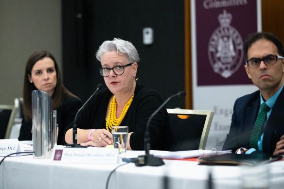 Penny Sharpe (centre) questions Amy Brown as she gives evidence at the NSW Parliamentary Inquiry into the appointment of John Barilaro to the New York Trade Commissioner role.