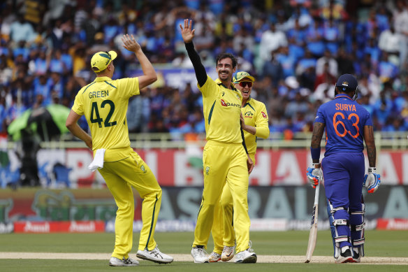 Mitchell Starc celebrates taking the wicket of Suryakumar Yadav in game two of the one-day series between India and Australia in Vizag.