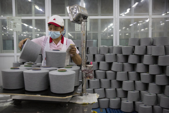 One in five cotton garments sold around the world contains yarn from Xinjiang, such as the spools pictured at a Huafu plant in April. 