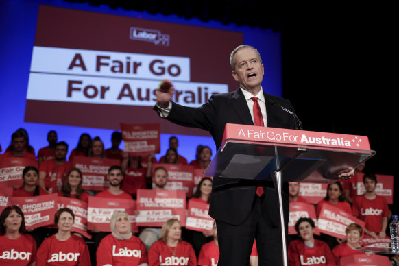 Labor’s signature red is seen at a campaign rally in 2019.