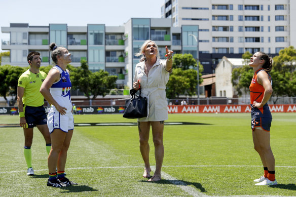 Dani Laidley tosses the coin