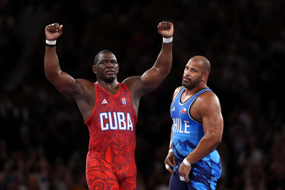 Cuban Mijain Lopez Nunez celebrates victory.