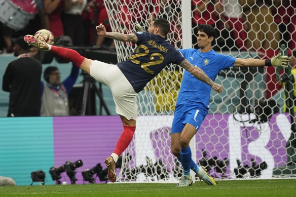 Theo Hernandez scores France’s opener.