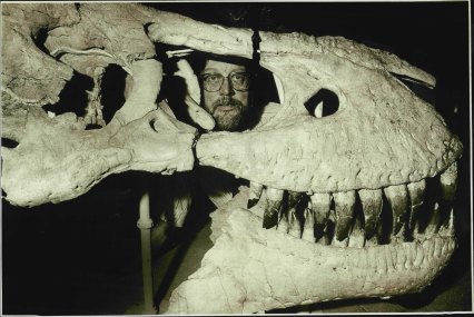 Dr Alex Ritchie with the skull of a Tarbosaurus bataar, 1994.