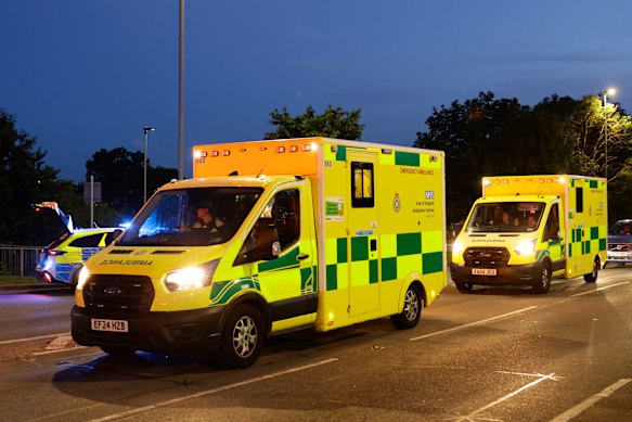 Ambulances are seen near the scene of a train crash south of Bedford, England. More than 30 emergency vehicles, a Hazardous Area Response Team, and an air ambulance are on the scene treating multiple serious injuries.