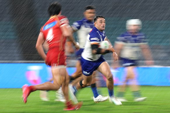 Kurtis Morrin takes on the Dolphins defence.