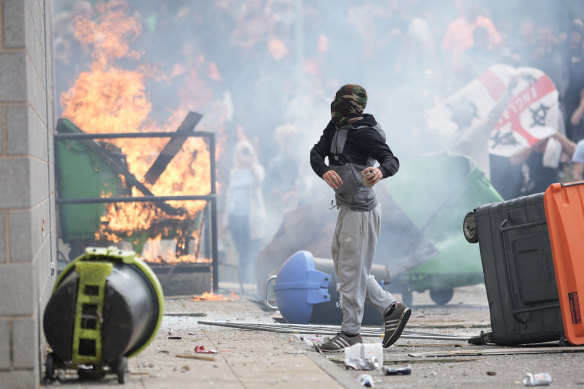 Anti-migration protesters during riots in Manvers, England, outside a hotel used as accommodation for asylum seekers.