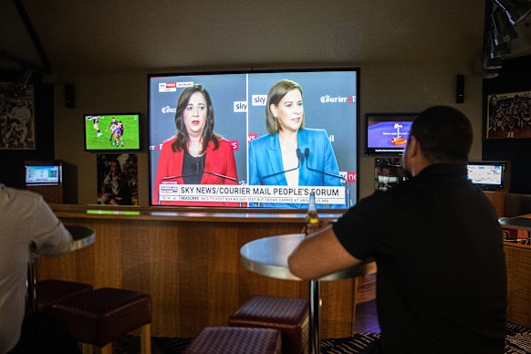 Punters watch the “People’s Forum” between then premier Annastacia Palaszczuk and opposition leader Deb Frecklington in Brisbane during the October 2020 election campaign.
