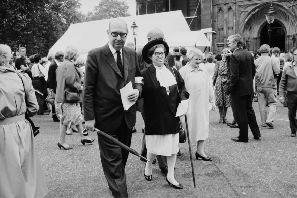 English poet Philip Larkin (1922 - 1985) with Monica Jones at Westminster Abbey in 1984.