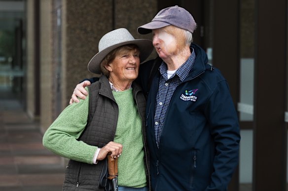 Leah Mooney with her husband Tim Mooney outside the Federal Court.