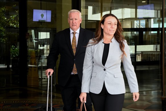Defence barrister Leslie Nicholls and solicitor Urania Zafiris leave court on Friday.
