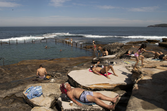 People soak up the sun at Mahon Pool in Maroubra on Thursday.