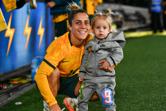 Matildas midfielder Katrina Gorry with her daughter Harper.