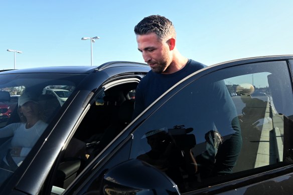 Souths legend Sam Burgess leaves club headquarters on Wednesday.