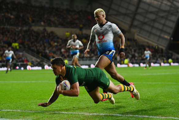 Latrell Mitchell scores one of Australia’s seven tries.