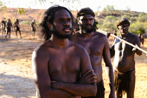 Baykali Ganambarr (front left) as Woorak in Roderick MacKay's feature film The Furnace.  