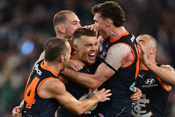 Patrick Cripps was mobbed by teammates after slotting the match-winning goal.