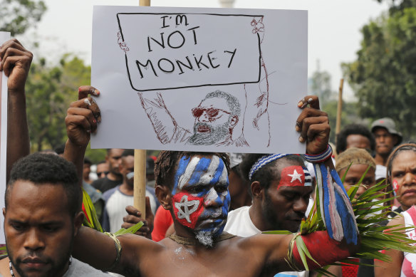 August 28, 2019: Papuan students painted with the Morning Star flag protest over the Surabaya university incident.