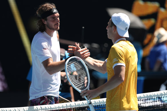 Tsitsipas shakes hands with Tallon Griekspoor.