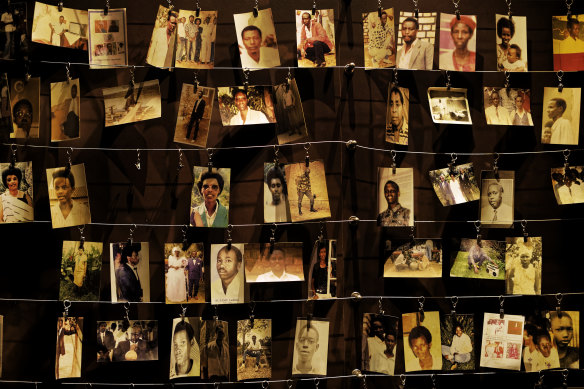 Family photographs of some of those who died hang on display in an exhibition at the Kigali Genocide Memorial centre in the capital Kigali, Rwanda. 