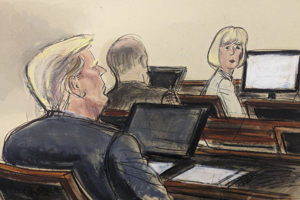 In this courtroom sketch, E. Jean Carroll, right, turns around towards Donald Trump, seated, left, on Tuesday in New York. 